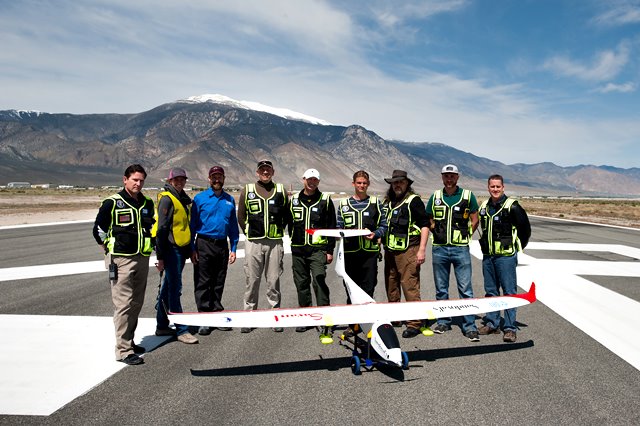 NIAS, DRI and Drone America members pose after a successful flight of Drone America's Savant sUAS with cloud seeding flares at the Hawthorne Industrial Airport in Hawthorne, Nev. on Friday, April 29, 2016. Photo by Kevin Clifford/Drone America